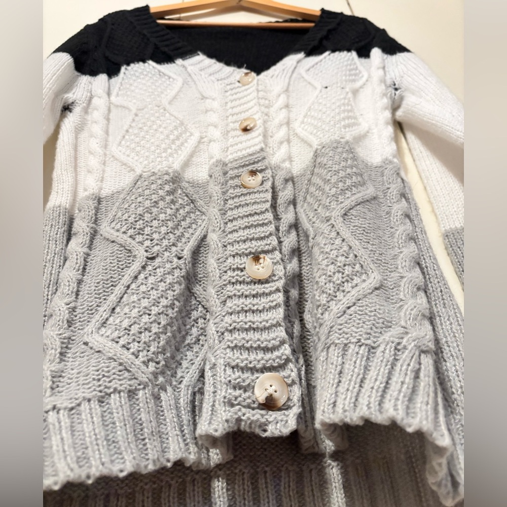 Black, Gray, and White Sweater